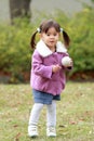 Japanese girl playing catch Royalty Free Stock Photo