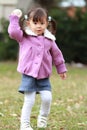 Japanese girl playing catch Royalty Free Stock Photo