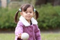 Japanese girl playing catch Royalty Free Stock Photo