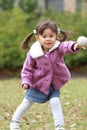 Japanese girl playing catch Royalty Free Stock Photo