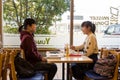 Japanese girls at a coffee shop.