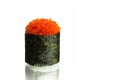 Japanese Gunkan sushi with red flying fish roe tobiko wrapped in nori eaweed isolated on white background with reflection Royalty Free Stock Photo