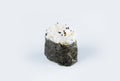 Japanese Gunkan Sushi with scallop and flying fish roe wrapped in nori seaweed. Side view Pan Asian dish Royalty Free Stock Photo