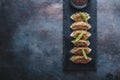 Japanese gyoza dumplings on black stone plate, copy space Royalty Free Stock Photo