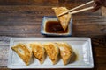 Japanese gyoza served in plate with delicious soy sauce dip Royalty Free Stock Photo