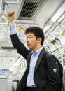 Japanese High school student on a subway in Kyoto