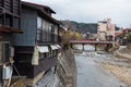 Japanese houses and bridges along river in Takayama, Japan Royalty Free Stock Photo