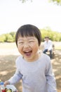 Japanese infant who is delighted with bento, Royalty Free Stock Photo