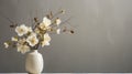 Japanese-inspired Gray Wall With White Flowers In Vase Royalty Free Stock Photo
