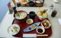 Japanese Kaisen Meal, tempura, noodle, rice, and pickles.