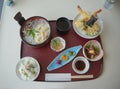 Japanese Kaisen Meal, tempura, noodle, rice, and pickles.