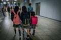 Japanese kids are going to school together with sisters by metro