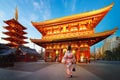 Japanese lady in Kimono dress walking in Sensoji Temple