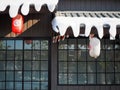 Japanese lantern hung in front of Japanese Restaurant, Japanese text on lantern is \