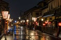 Japanese lanterns light empty street in historic Gion district after rain Royalty Free Stock Photo