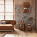 Japanese living room with wallpaper and wooden walls in orange and beige tones. Parquet floor, fabric sofa, carpets and decors. Royalty Free Stock Photo