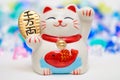 JAPANESE LUCKY CAT FIGURINE Royalty Free Stock Photo
