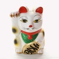 Japanese lucky cat figurine. Royalty Free Stock Photo