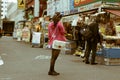 Japanese maid girl standing on a street in Akihabara, Tokyo, Japan