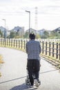 Japanese man pushing a stroller Royalty Free Stock Photo