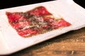 Japanese marbled meat Kobe beef on a plate, Tokyo, Japan. Close-up.