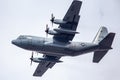 A JMSDF C-130 Hercules in flight