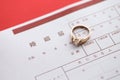 Japanese marriage registration blank document and wedding proposition ring on table