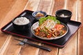Japanese meal tray with rice, soup and sauteed beef with salad