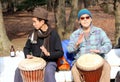 Japanese men practicing on the bongos in the park Tokyo