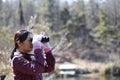 Japanese middle-aged woman, hobby of bird watching Royalty Free Stock Photo