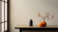 Japanese Minimalism: A Sparse Table With Vase And Pumpkins
