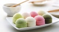 Japanese mochi: Soft, chewy rice cakes with vibrant colors, filled with red bean paste or ice cream