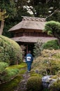 Japanese monk, priest in japanese Garden at Jiko-in temple