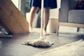 Japanese mother cleaning home floor