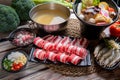 Japanese nabemono hotpot dish of thinly sliced meat and vegetables boiled in water and served with dipping sauces Royalty Free Stock Photo