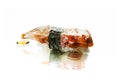 Japanese nigiri sushi with eel isolated on white background with reflection Royalty Free Stock Photo