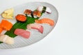 Japanese nigiri sushi set of traditional food on white plate Royalty Free Stock Photo