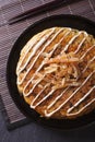 Japanese okonomiyaki pizza close-up. vertical top view Royalty Free Stock Photo