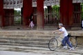 Japanese old man riding bicycle at Todai-ji Temple