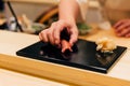 Japanese Omakase meal: Chutoro Sushi Medium Fatty Bluefin Tuna served by hand with pickled ginger on glossy black plate. Royalty Free Stock Photo