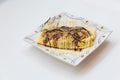 Japanese Omlette Topping with Sauce, Mayonaise, Katsuobushi dried, fermented, and smoked skipjack tuna and Seaweed Royalty Free Stock Photo