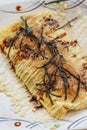 Japanese Omlette Topping with Sauce, Mayonaise, Katsuobushi dried, fermented, and smoked skipjack tuna and Seaweed Royalty Free Stock Photo