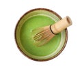 Japanese organic matcha green tea in ceramic bowl with bamboo whisk isolated on white background, clipping path