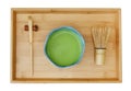 Japanese organic matcha latte green tea ceremony with bamboo whisk chasen and hooked bamboo scoop chashaku on bamboo tray top Royalty Free Stock Photo