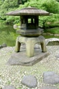 Japanese outdoor stone lantern in zen garden Royalty Free Stock Photo