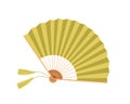 Japanese paper hand fan with fringe and bamboo decor. Asian traditional souvenir, folding object. Oriental handheld