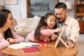 Japanese Parents Teaching Preschool Daughter Playing Learning Games At Home Royalty Free Stock Photo