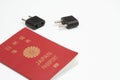 Japanese passport and conversion plug Royalty Free Stock Photo