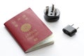 Japanese passport and electric plug Royalty Free Stock Photo