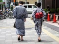 Japanese people couple lovers wearing traditional japan clothes yukata walking go to travel visit and respect praying god deity